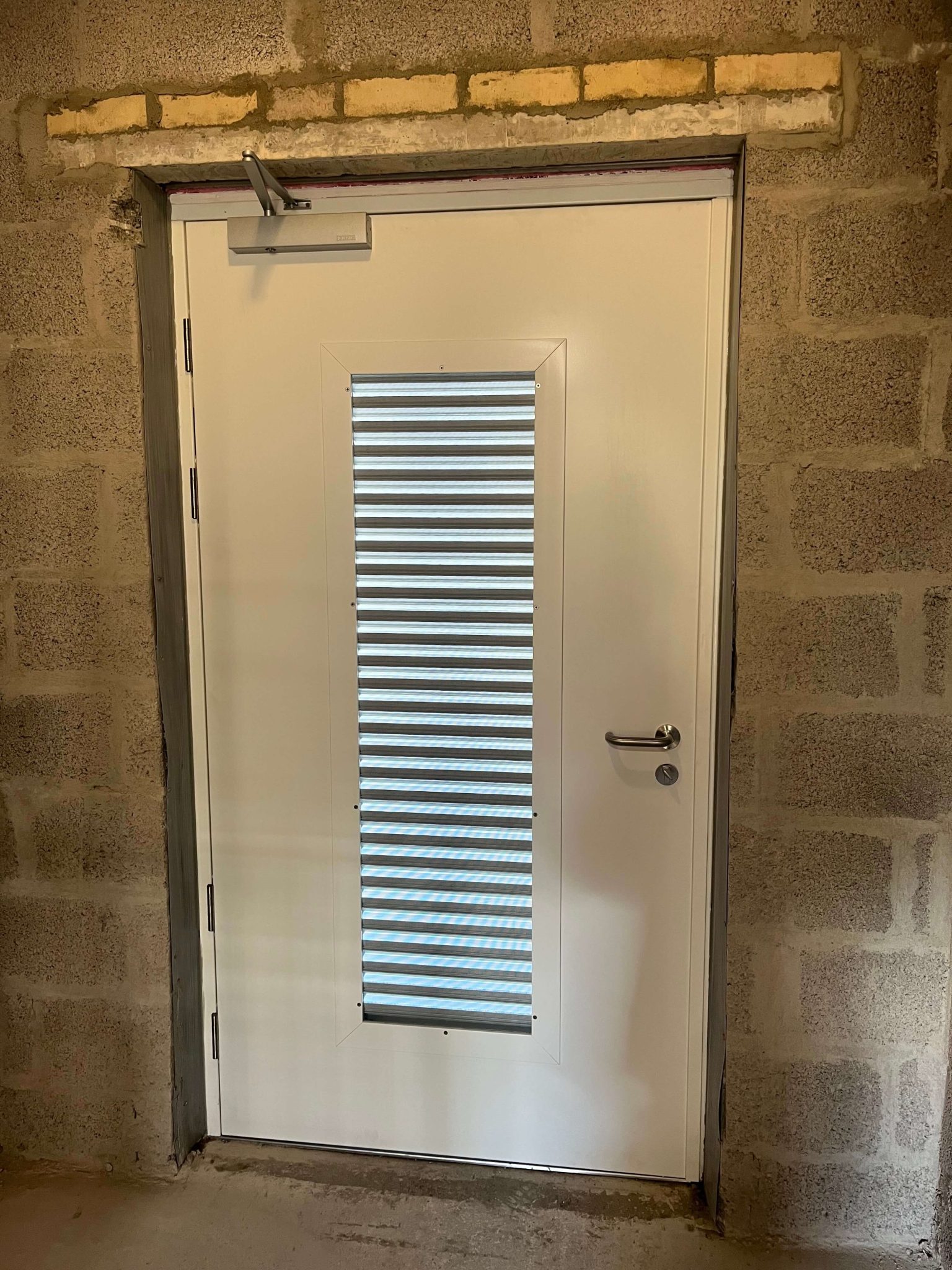 single steel door with louvre